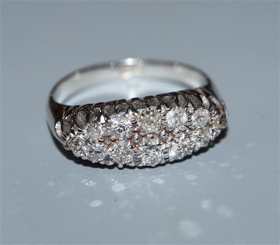An 18ct navette-shaped twelve-stone two row diamond cluster ring, size P.